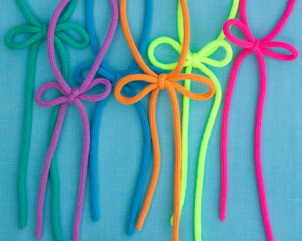 knit triplets bow ties