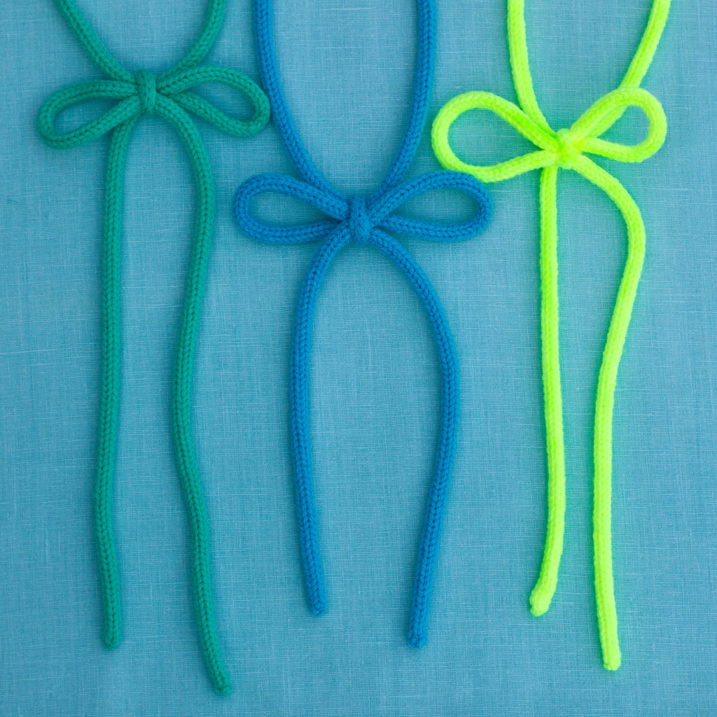 knit triplets bow ties