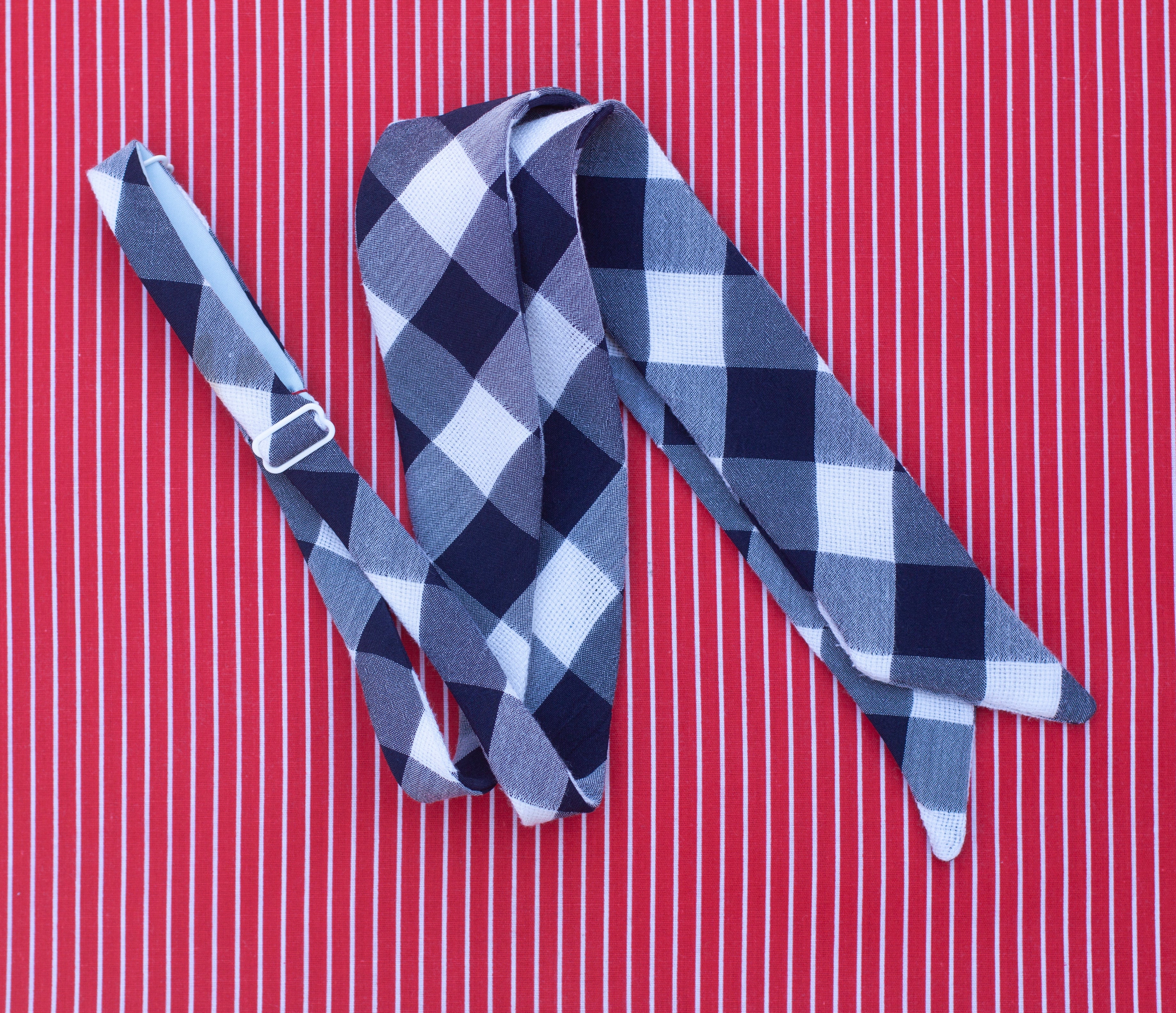 Navy gingham secretary bow