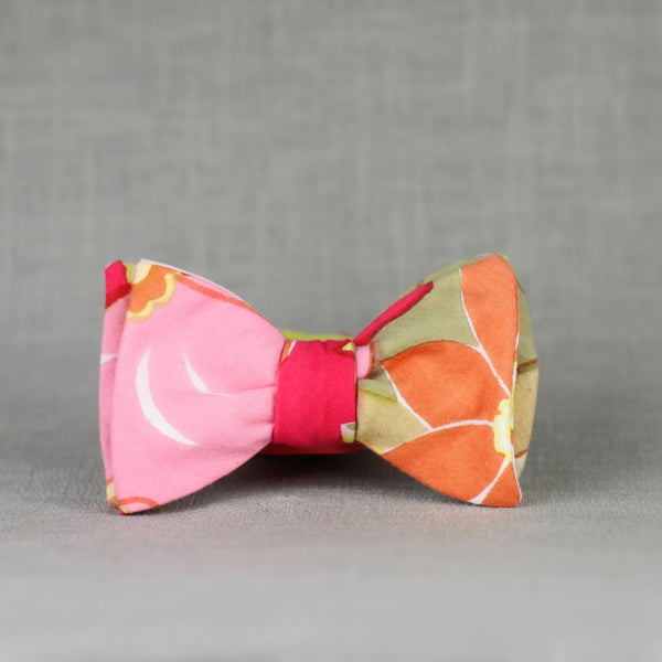 desert floral bow tie in blush pink, pistachio green, magenta, orange, olive green, & white.