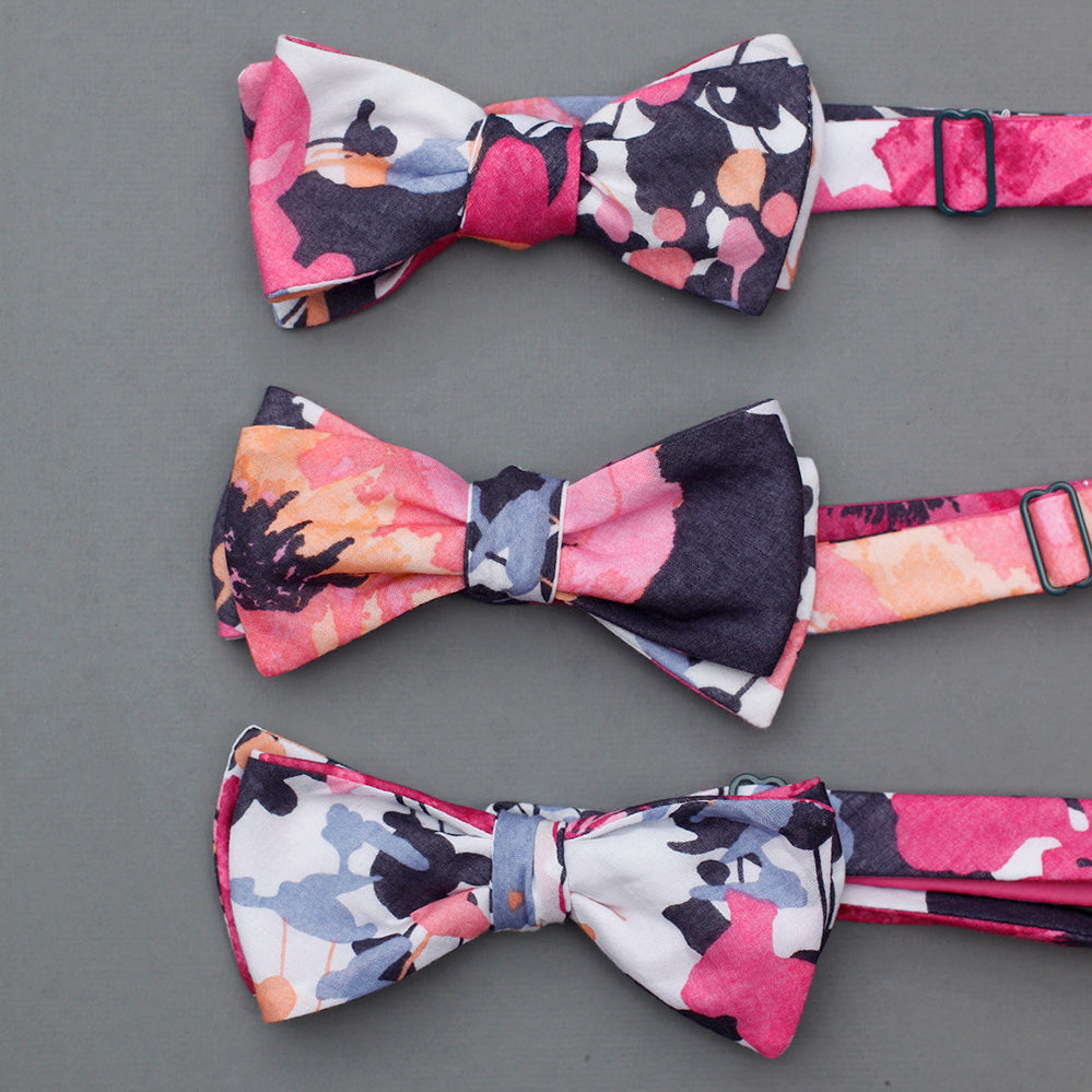 bright floral bow tie in navy, magenta, peach, coral, periwinkle, & white