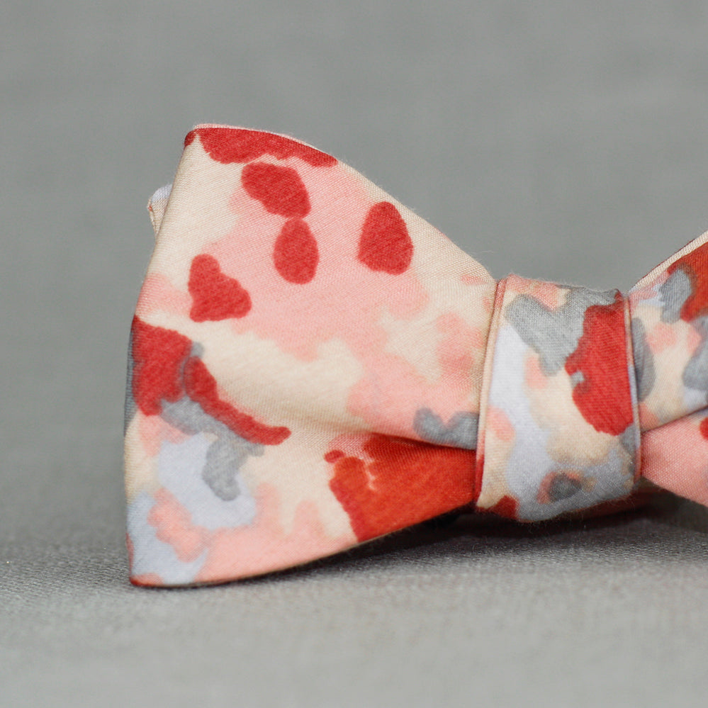 peach, coral, red, and grey abstract floral bow tie
